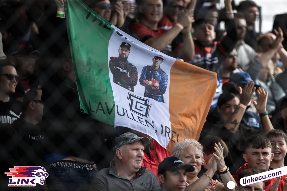 Fans of The Shanahans in the stands with an Irish Flag.